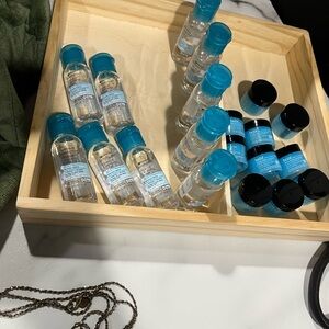 Set of Skincare Bottles with Blue Caps